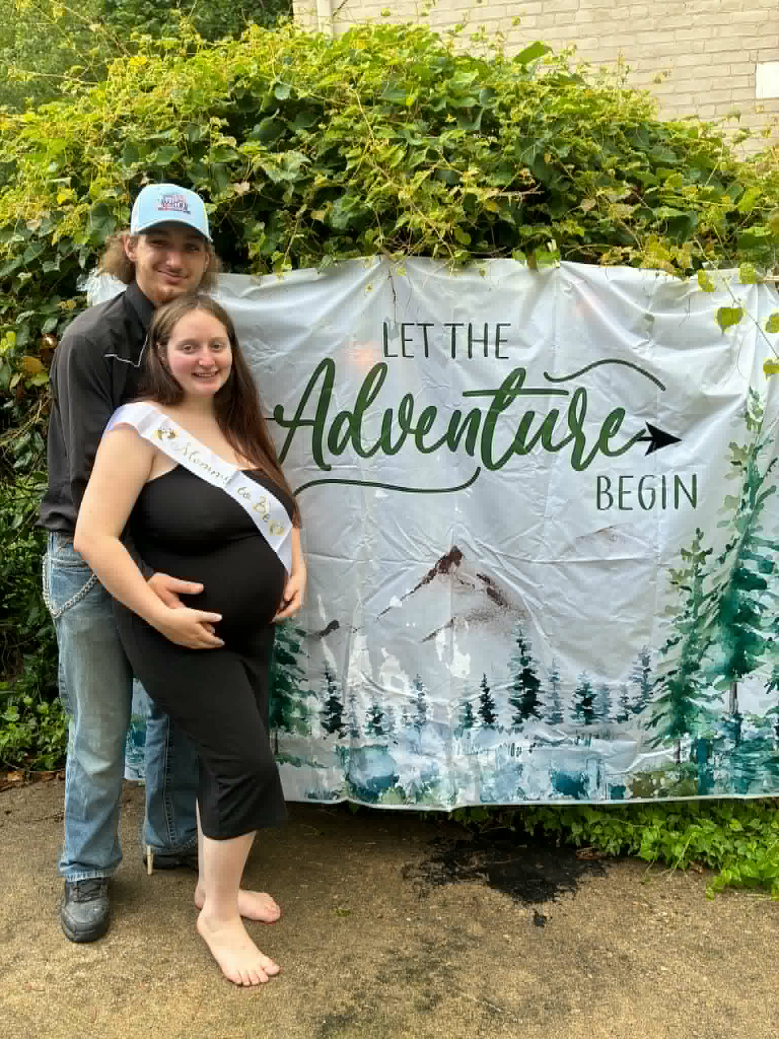 Austin Clemons and his fiancée in Falmouth, Kentucky — baby on the way